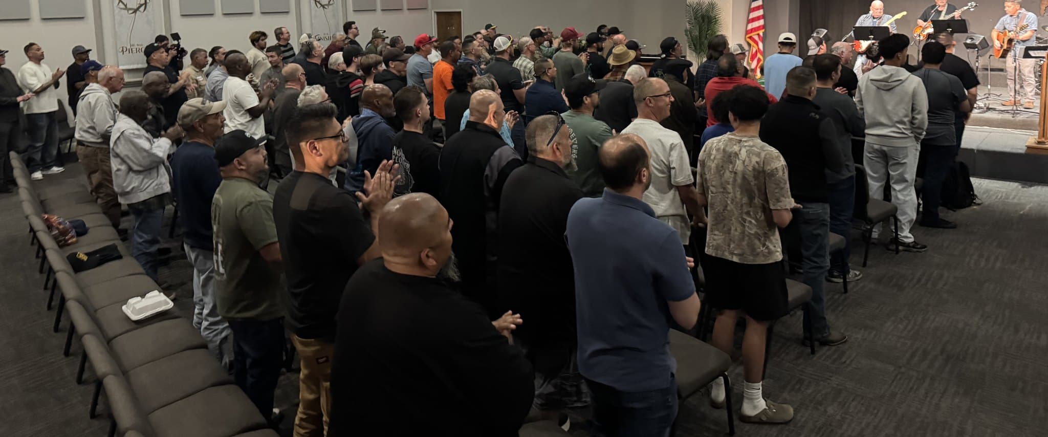 Men gathered for worship at a GCC Madera men's ministry night