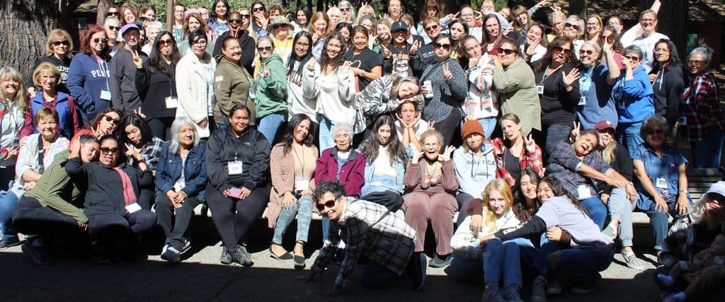 Women of Grace Community Church gathered under the pines at the 2024 women's retreat